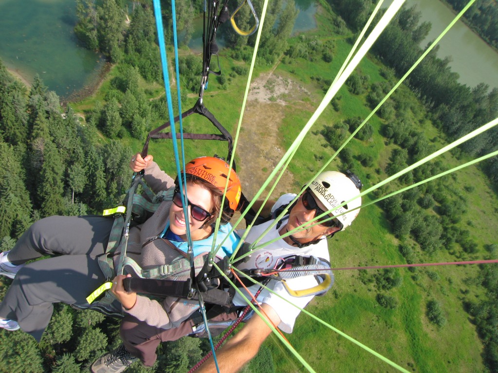 Overhead paragliding shot with Altitude Adventures company