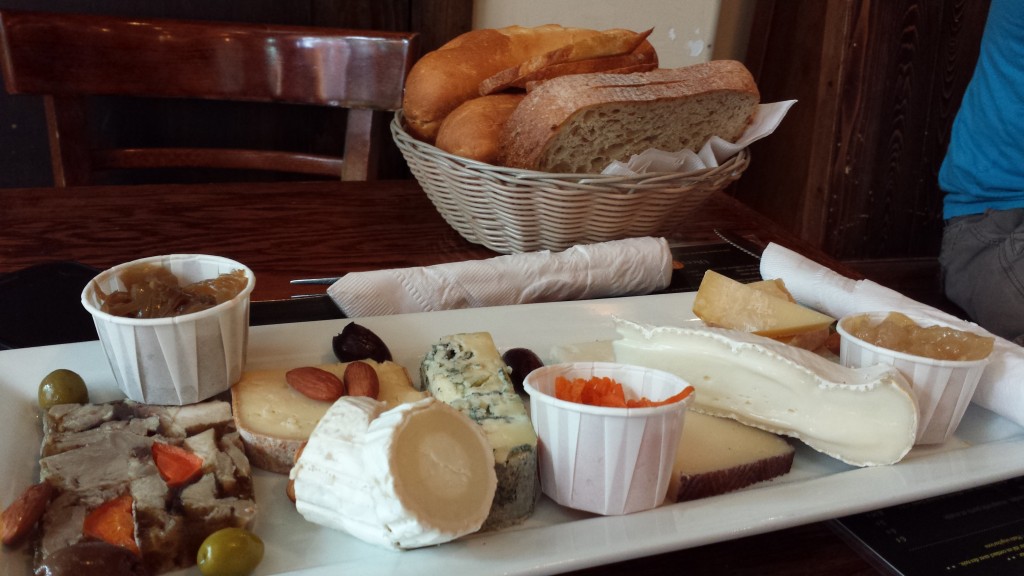 Beautiful Quebec cheeses served with tartine, bread, nuts, and carrot slaw.