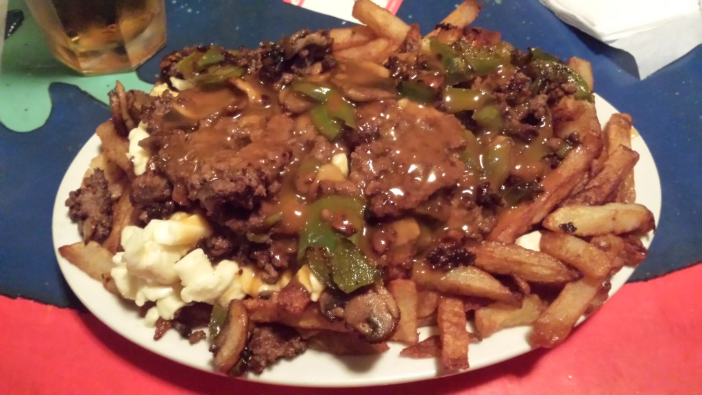 This is not my poutine but my dinnermate. 