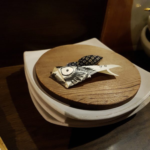 Paper Sardine card on plate