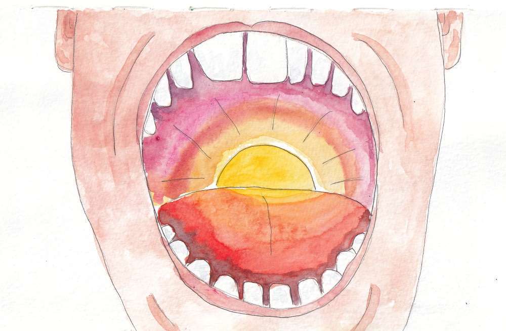 A watercolour illustation of a mouth, inside is a gold ball and colour is rising that looks like a sunrise.