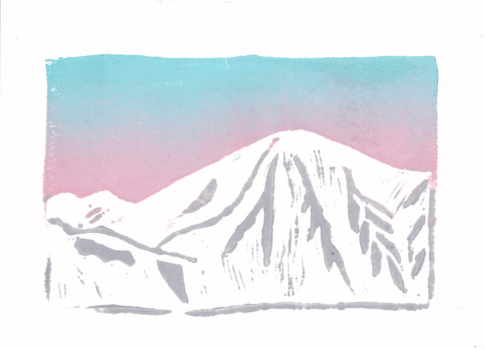 Cascade Mountain in Banff with a cotton candy pink and blue sunset behind it