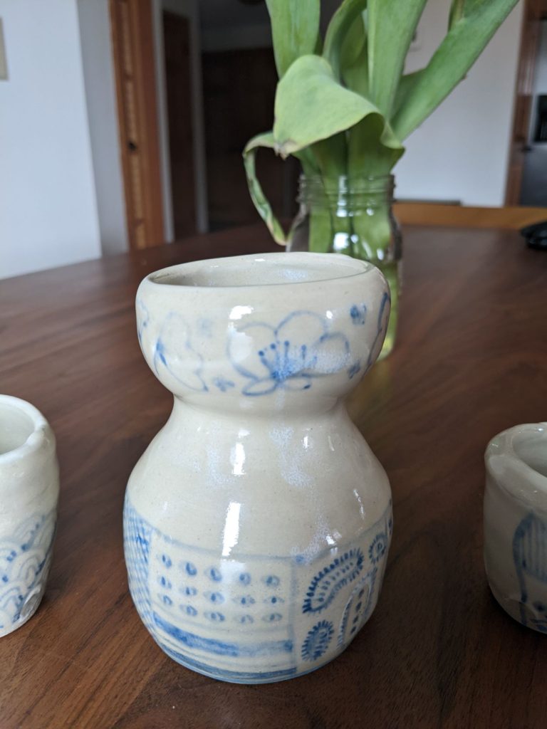 The finished carafe with some traditional illustrations of sakura and ginko leaves. The other illustrations are patterns inspired by Yayoi Kusama