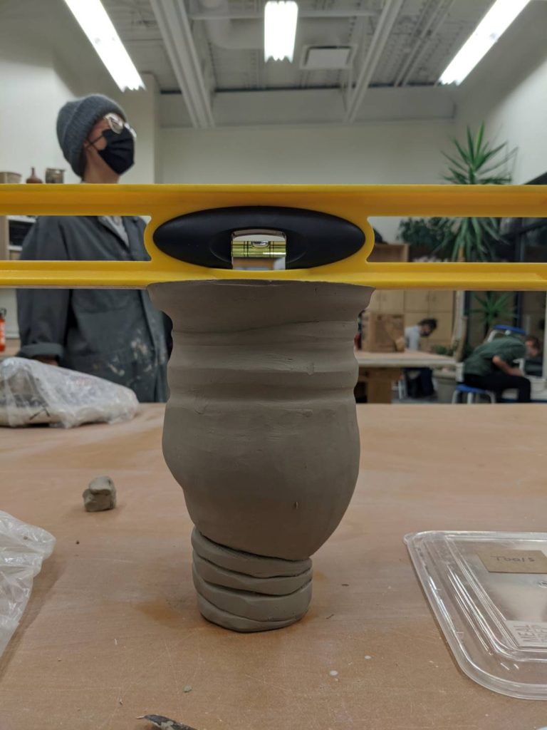 making a pottery table lamp - checking with a level